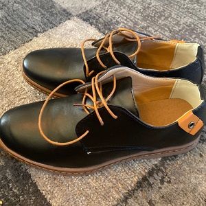 New men dress shoe size 38 or 7.5 or 9. 3 inches black tie never worn